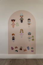 Six Dressables magnetic characters with mix-and-match outfits on the Isla Blush Wonder Arch